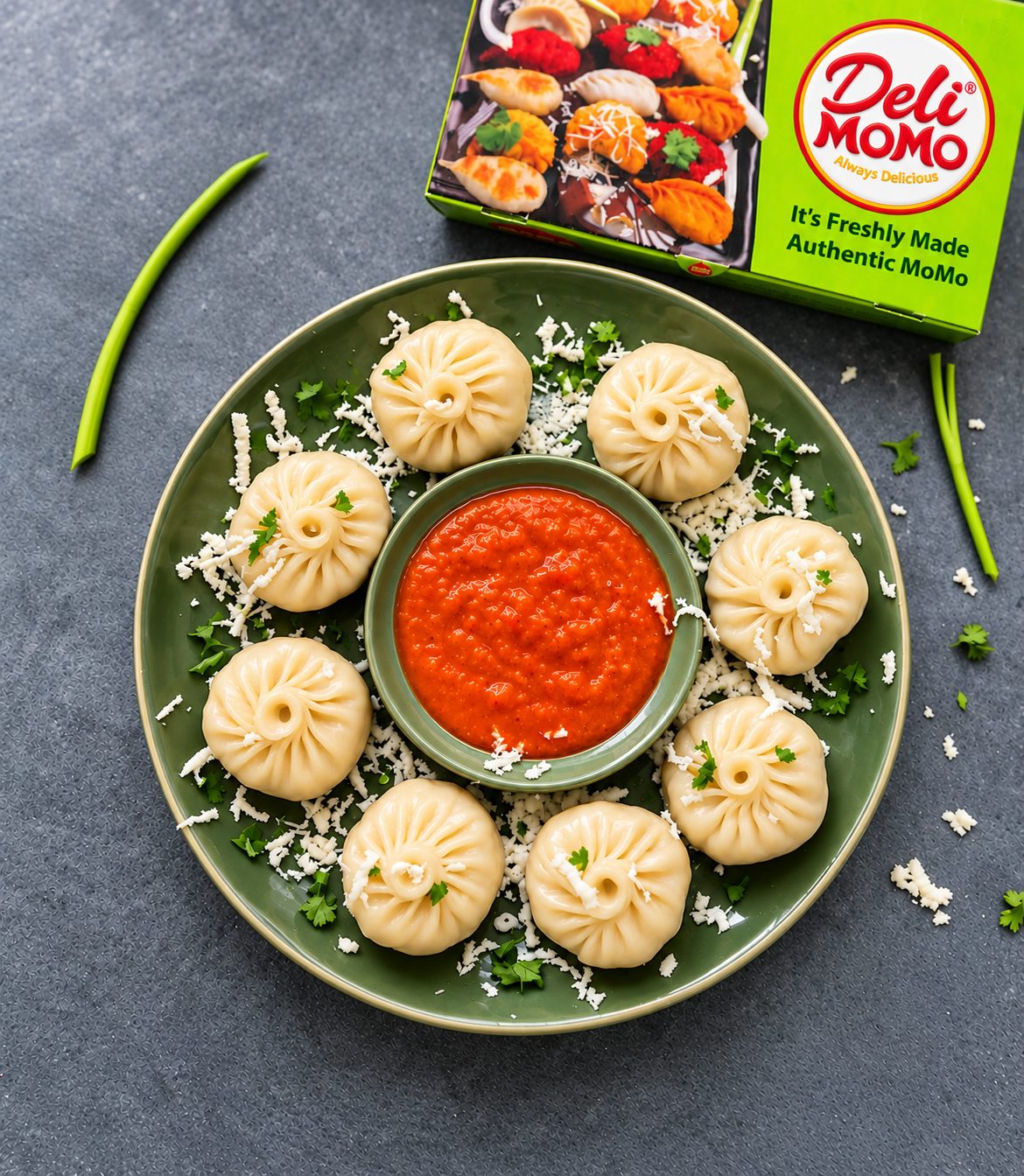 Paneer Momo plated with red chilli chutney